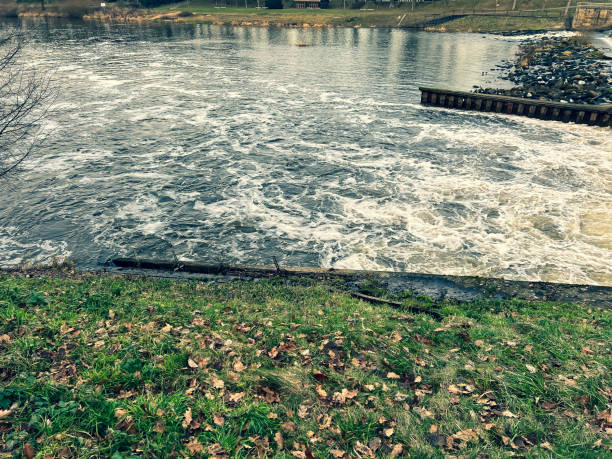 Swirled water at the waterfall in winter.