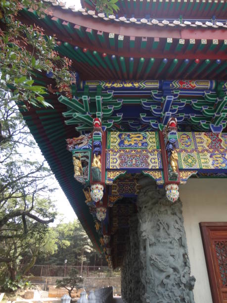 istock Details of a decorated rooftop from a Buddhist temple 1368503173