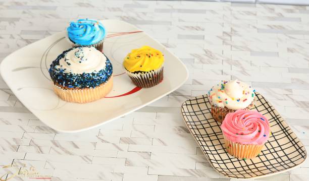 istock Cupcakes strawberry vanilla muffin 1368506051