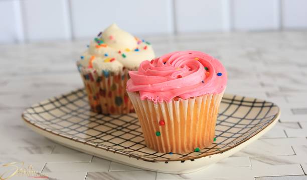 istock Cupcakes strawberry vanilla muffin 1368506055