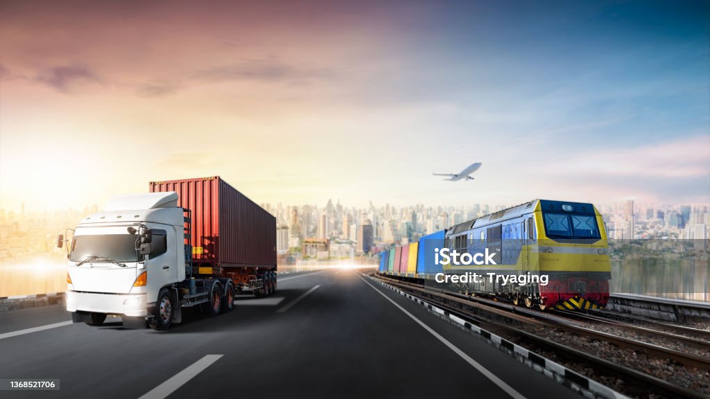 Global business logistics import export of Container Truck on highway and Freight Train with Cargo Plane at city background, Sunset time, Transportation industry concept, Depth blur effect Rail Transportation Stock Photo