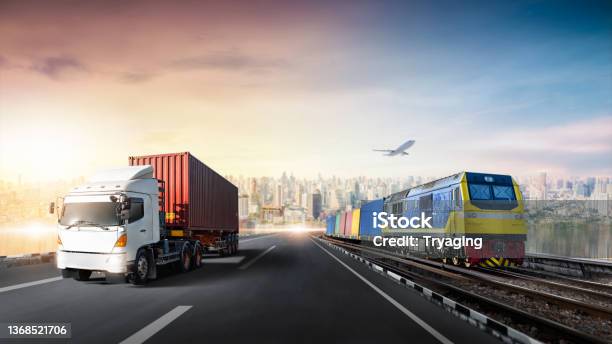 Global Business Logistics Import Export Of Container Truck On Highway And Freight Train With Cargo Plane At City Background Sunset Time Transportation Industry Concept Depth Blur Effect Stock Photo - Download Image Now