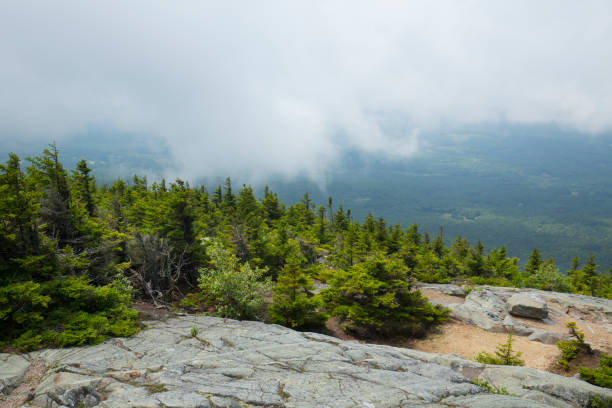 istock Low clouds obscure the valley below the Mt. Kearsarge summit. 1368524829