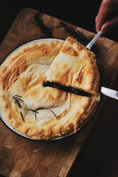 istock Mushroom and Ale pie, serving up, part of a series 1368529111