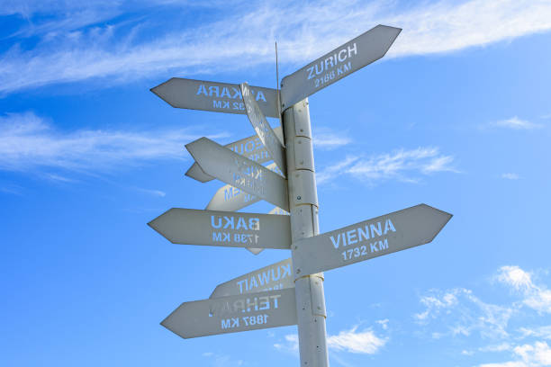 istock White metal signpost with the blank nameboards. Decision making concept 1368529945