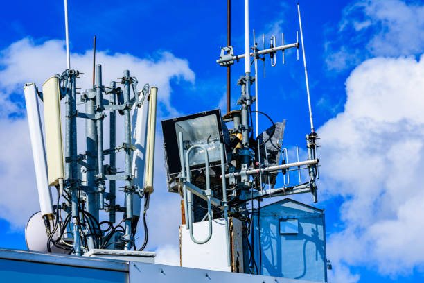istock Telecommunication antennas and wireless communication antenna transmitter against the blue sky 1368529953