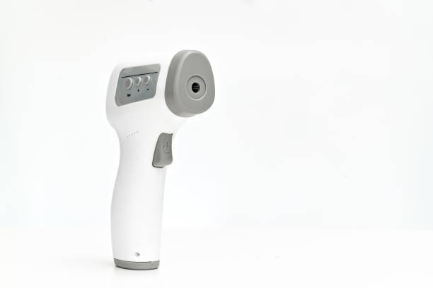 istock contactless electronic thermometer on white background. 1368532502