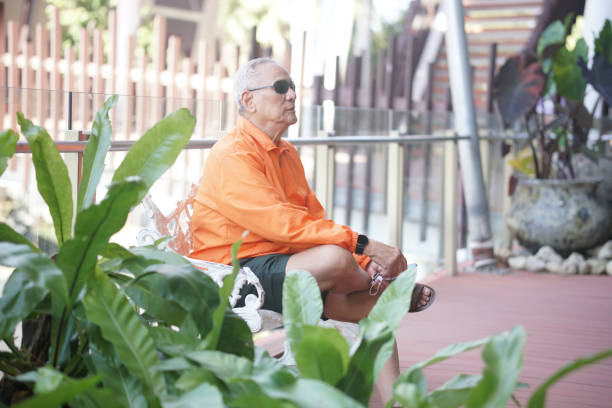 istock old elderly senior elder man relaxing on terrace. 1368532723