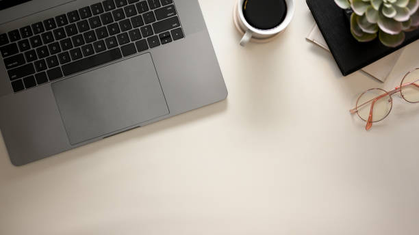 istock Modern home office desk workspace with laptop on white background. 1368533321