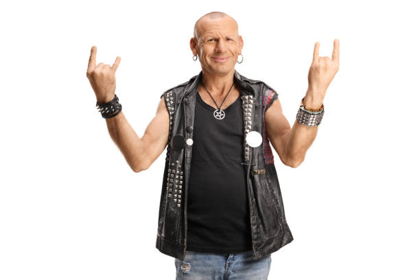 istock Guy in a leather vest gesturing rock and roll sign with both hands 1368535701