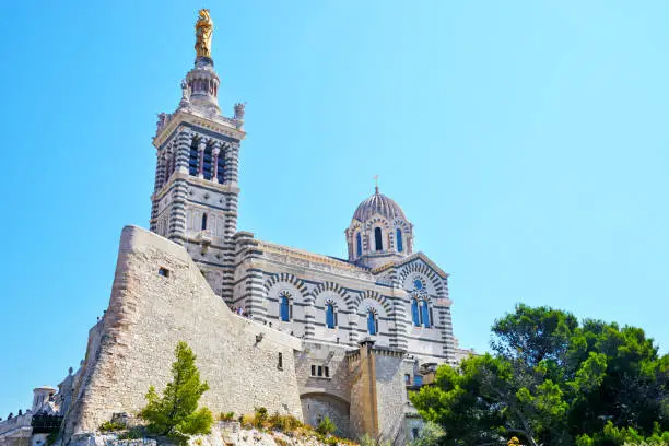 Notre-Dame de la Garde is a Catholic basilica began in 1852 is icon that's visible from across Marseille, France
