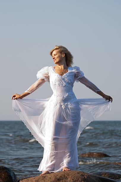 istock woman in seaside 136854167