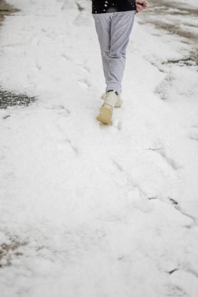 istock Walking on the first morning snow 1368544835