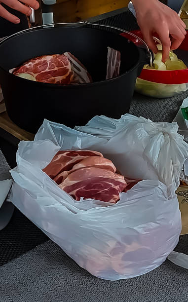 istock Preparation for layered meat in the Dutch oven 1368545830