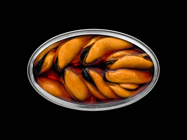 Photo of Overhead view of a tin can with mussels inside.