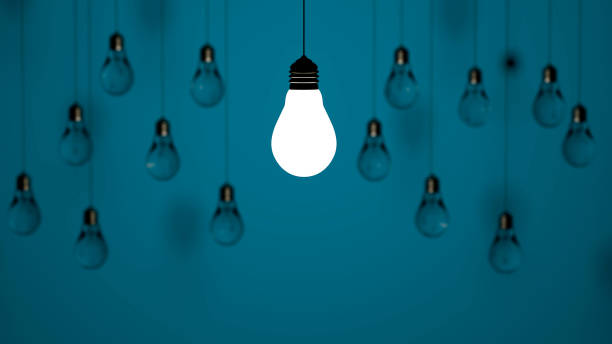 istock Light bulb idea. 3d render light bulb shines next to the extinguished ones. Leadership, inspiration, right decision and energy saving concept 1368549650