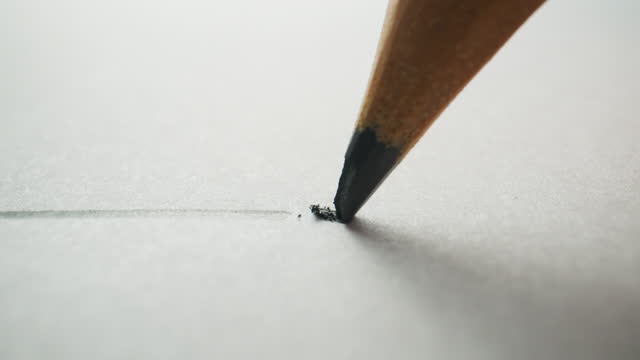 Pencil breaking while drawing on paper