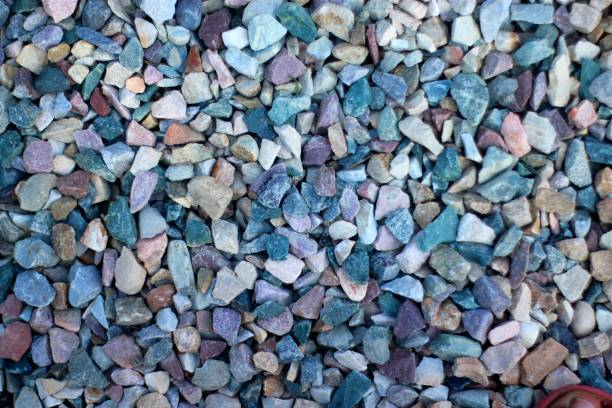 istock Stone texture background wallpaper, small pebble stone background, textured background 1368552831