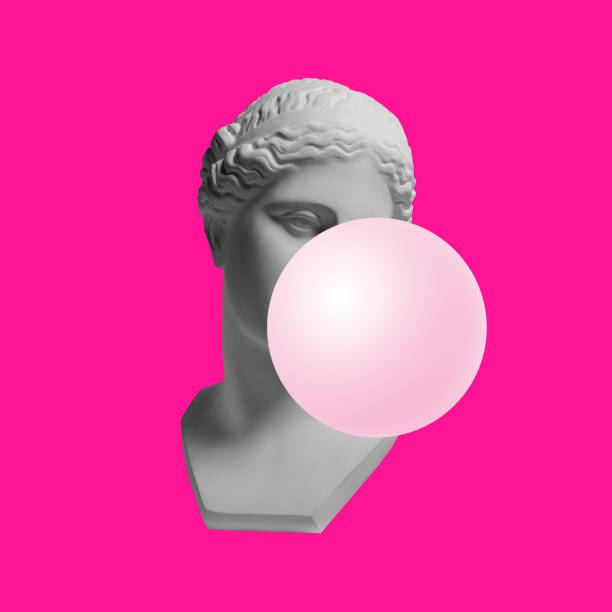 istock Creative moern design. Antique statue bust with pink bubble gum isolated over neon pink background 1368554016