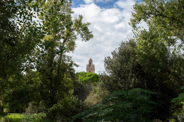 istock Building seen trough some big trees from old Turia riverbed. Valencia, Spain 1368554298