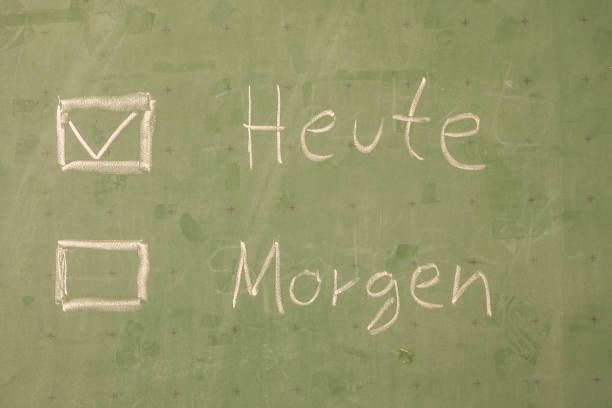 istock Chalk board with the words Today and Tomorrow in german 1368560383