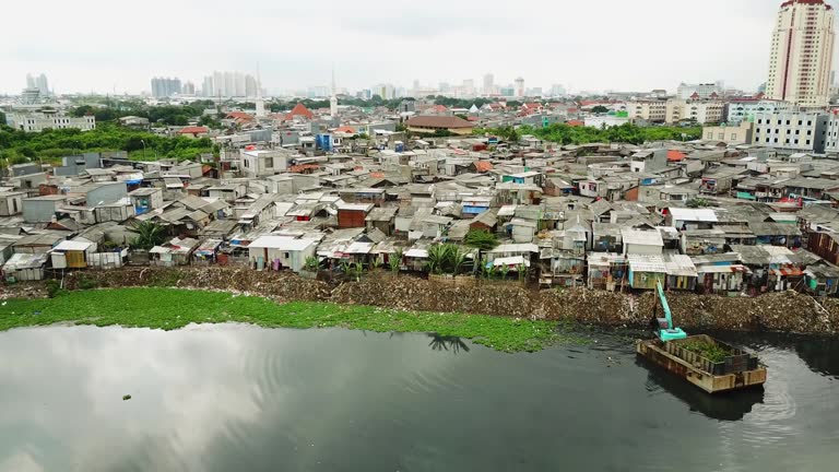 View of crowded slum homes on lakeside