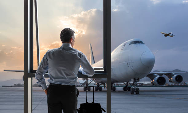 istock Man Waiting for Flight in Airport Lounge 1368563722