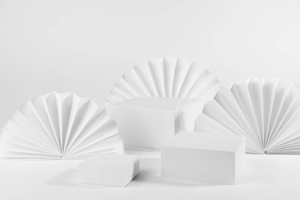istock Minimalist simple scene mockup with set of three white rectangle box podiums template for showing, presentation product or goods with semicircle paper fans in geometric style, corner, side view, 3d. 1368564760