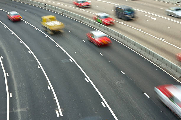 istock Cars in motion on lanes 136856928