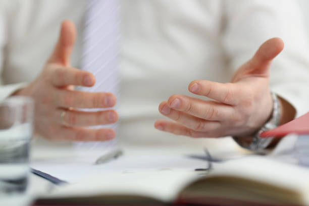 istock Male arm articulate during conference conversation in office 1368570802