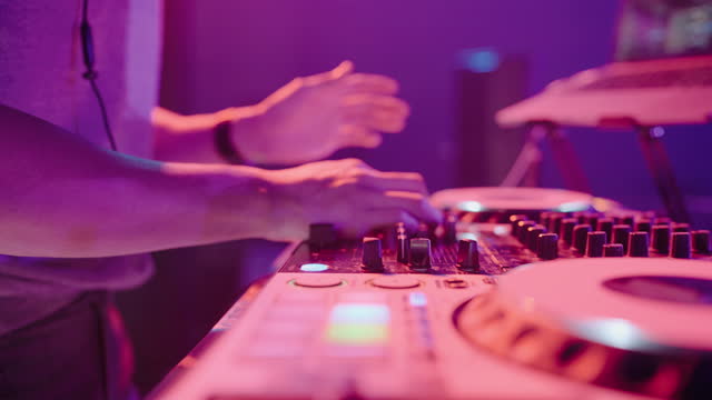 DJ Playing Music in Nightclub