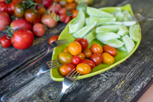 Tomato and Cucumber Salad on the Table - Good Agricultural Practice