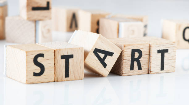 istock START word arranged with wooden letters on a white background. 1368572653