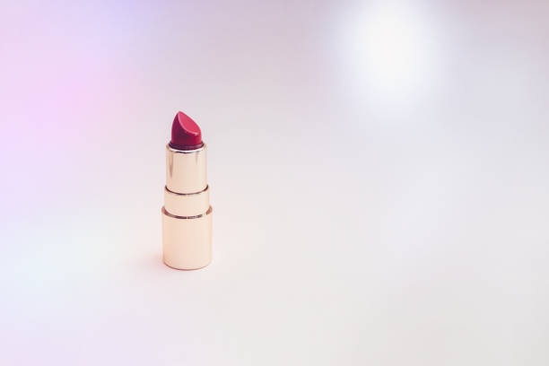 istock red lipstick in a gold case on a pink background 1368574748