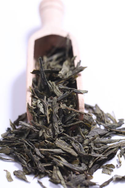 istock Green tea dried and rolled leaves 1368574778