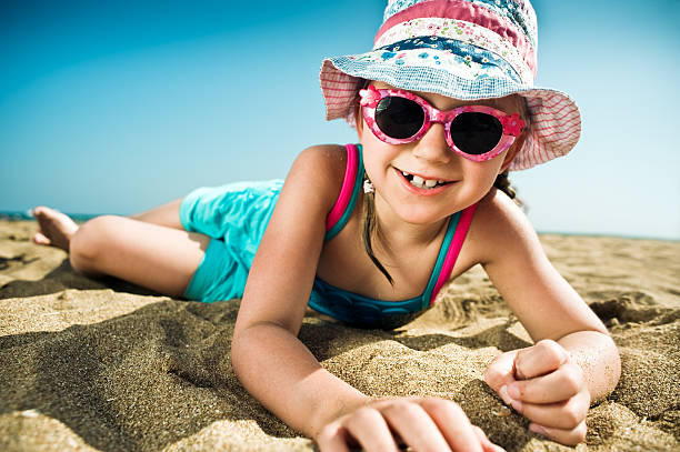 istock Little girl by the sea 136857697