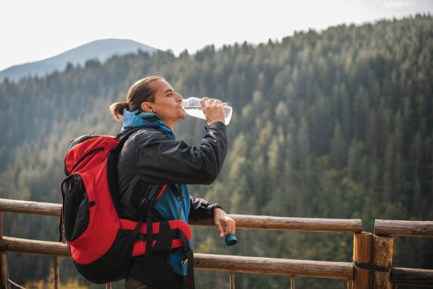 istock Tired Hiker Taking A Break On A Beautiful Background 1368577736