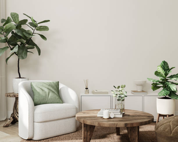 светлый интерьер гостиной с пустой светлой стеной - style armchair contemporary furniture стоковые фото и изображения