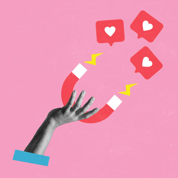 istock Creative design. Conemporary art collage with female hand holding magnet and magnetizing likes symbol isolated over pink background 1368580974