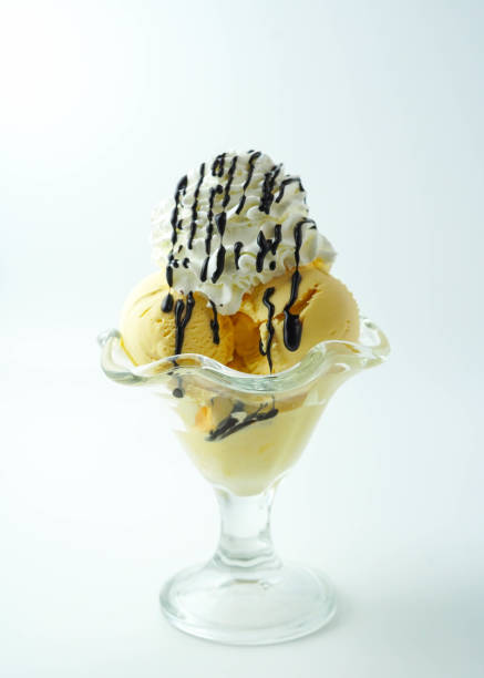 istock Cup of ice cream with chocolate syrup 1368581137
