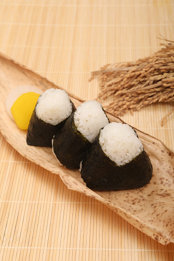 Onigiri are made by putting your favorite ingredients into freshly cooked hot rice, and making the inside soft and the outside firm.