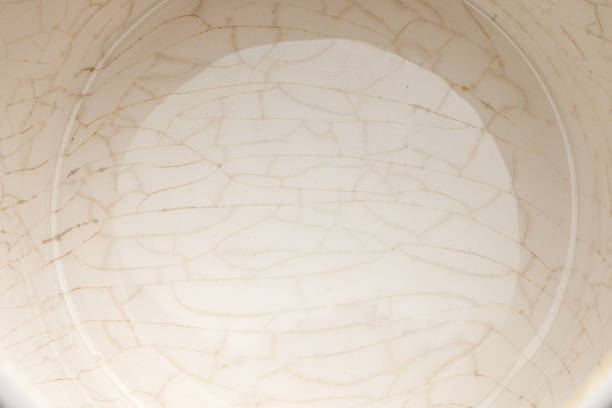 istock cracked glaze on the bottom of a white ceramic cup 1368589730