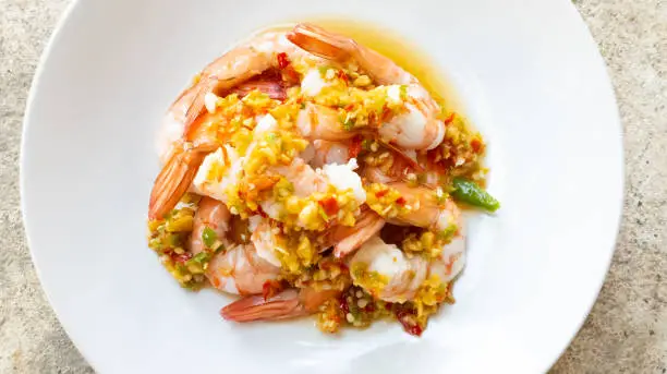 Photo of Spicy Shrimp Salad with Garlic chilli fish sauce and lemon in a plate