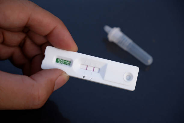 istock Covid-19 positive result cassette from a rapid antigen test kit (ATK) 1368592255