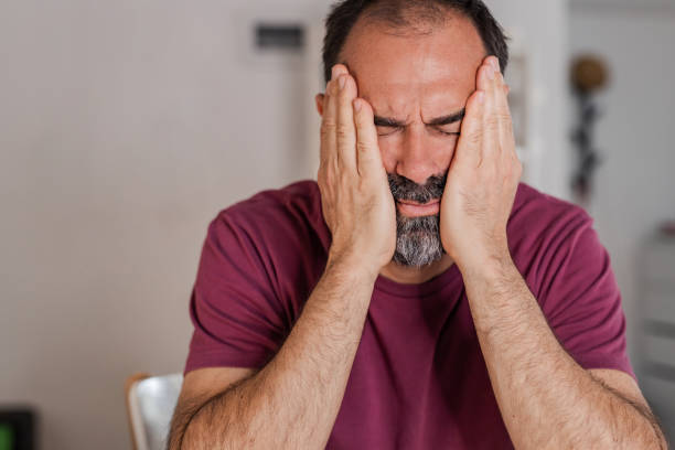 istock Mature man feeling tired and exhausted 1368593887