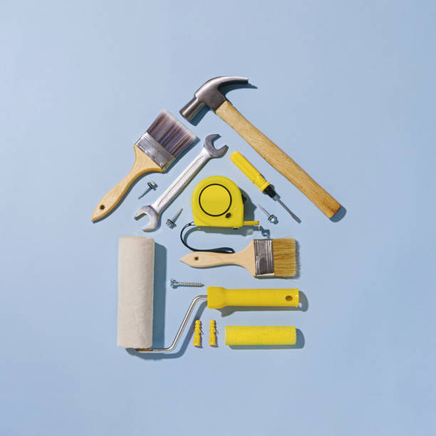 istock Creative flat lay still life with tools forming a small house 1368598693