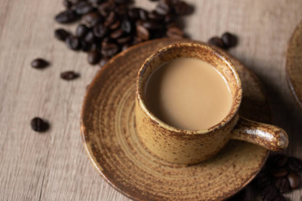 istock hot coffee in brown cup on wooden background 1368602783