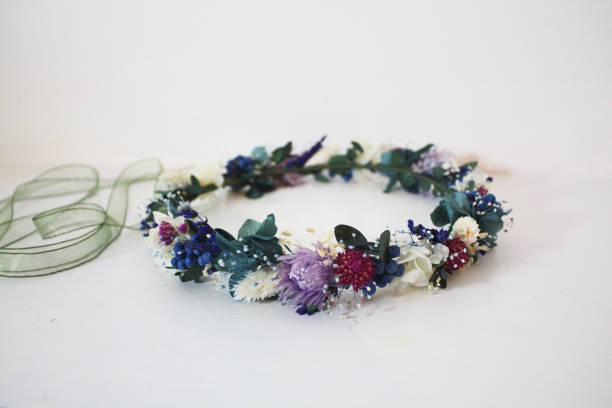 Flower crown - blue purple Dried and preserved flower crown. Preserved flowers are real flowers which treated to last for a few years without water. floral crown photos stock pictures, royalty-free photos & images