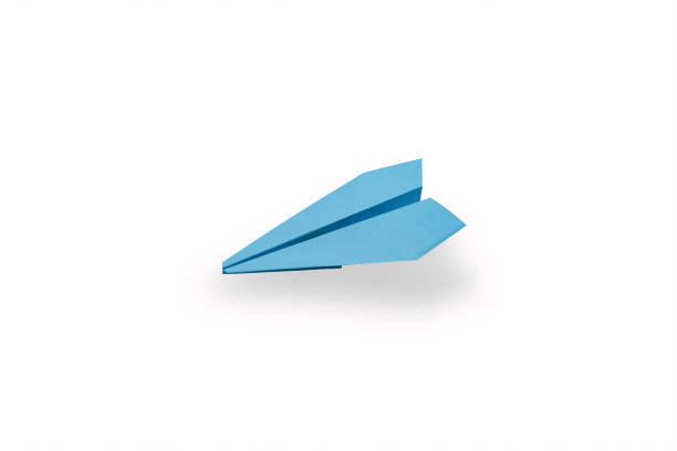 istock Side view of a flying blue paper airplane, isolated on a white background 1368604298