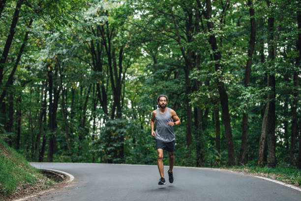 istock An Ambitious Sportsman Running His First Marathon 1368607756